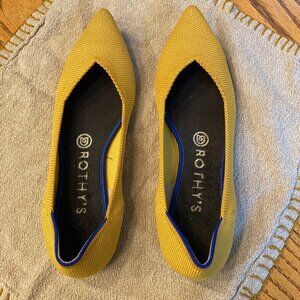 Nearly perfect yellow Rothy slip ons with pointed toe